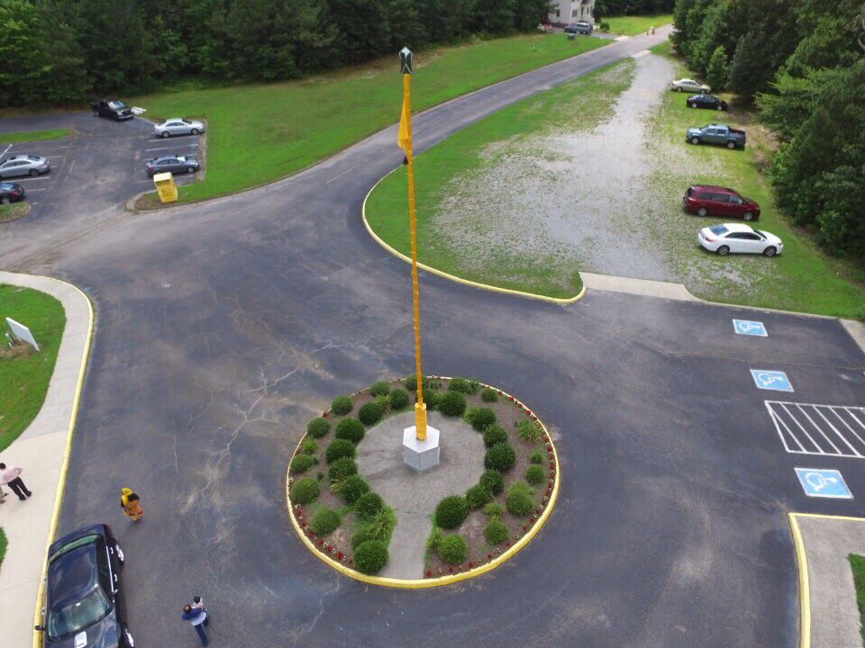 Aerial view of the Nishan Sahib rising above the Gurdwara grounds